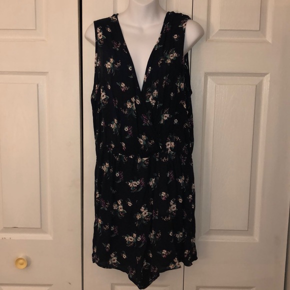 Rue21 Dresses & Skirts - Rue 21 Navy Blue Floral Romper size XL.